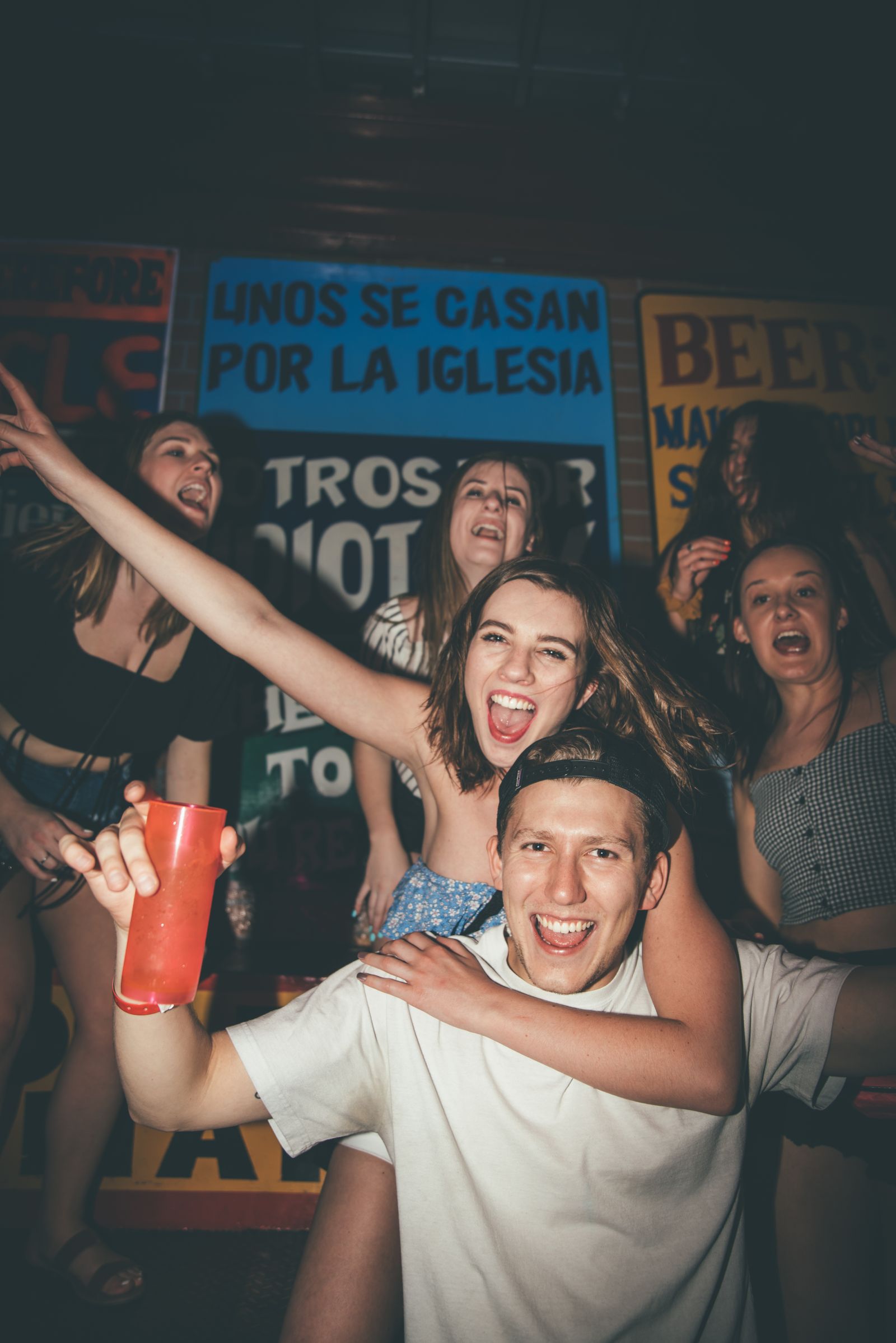 Friends moving and celebrating together at a lively party